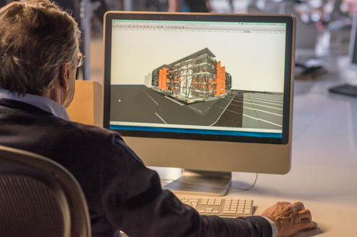 Lead construction firm employee receiving professional software and hardware support